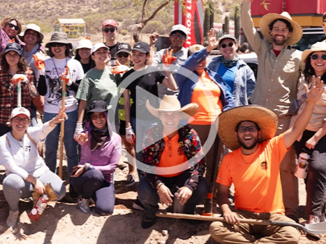 Group photograph of volunteers participating in a cross-cultural sustainable median design project in Hermosillo, Mexico.