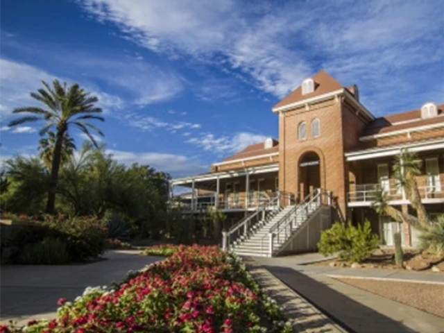 University of Arizona Old Main building against a blue sky.